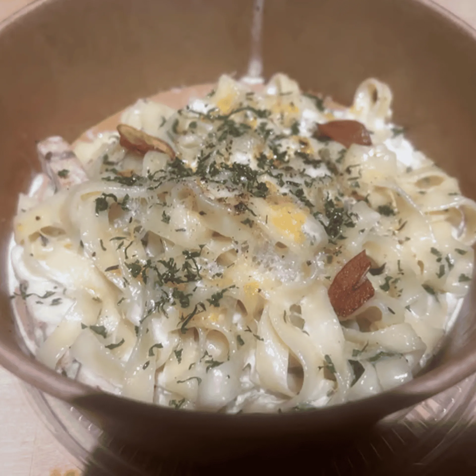Classic carbonara pasta with fresh handmade noodles at Aglio Calgary